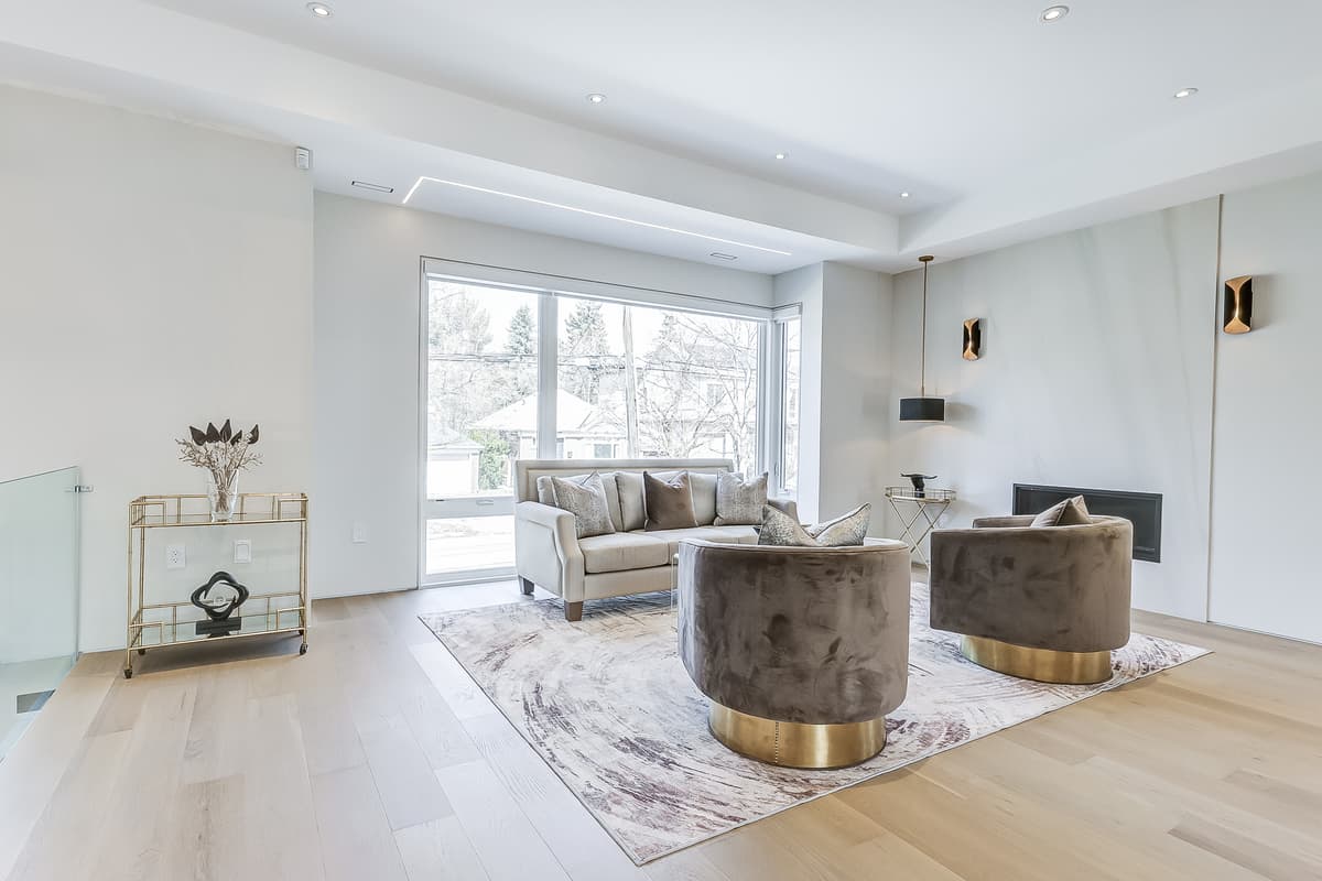 Custom home living room with marble fireplace