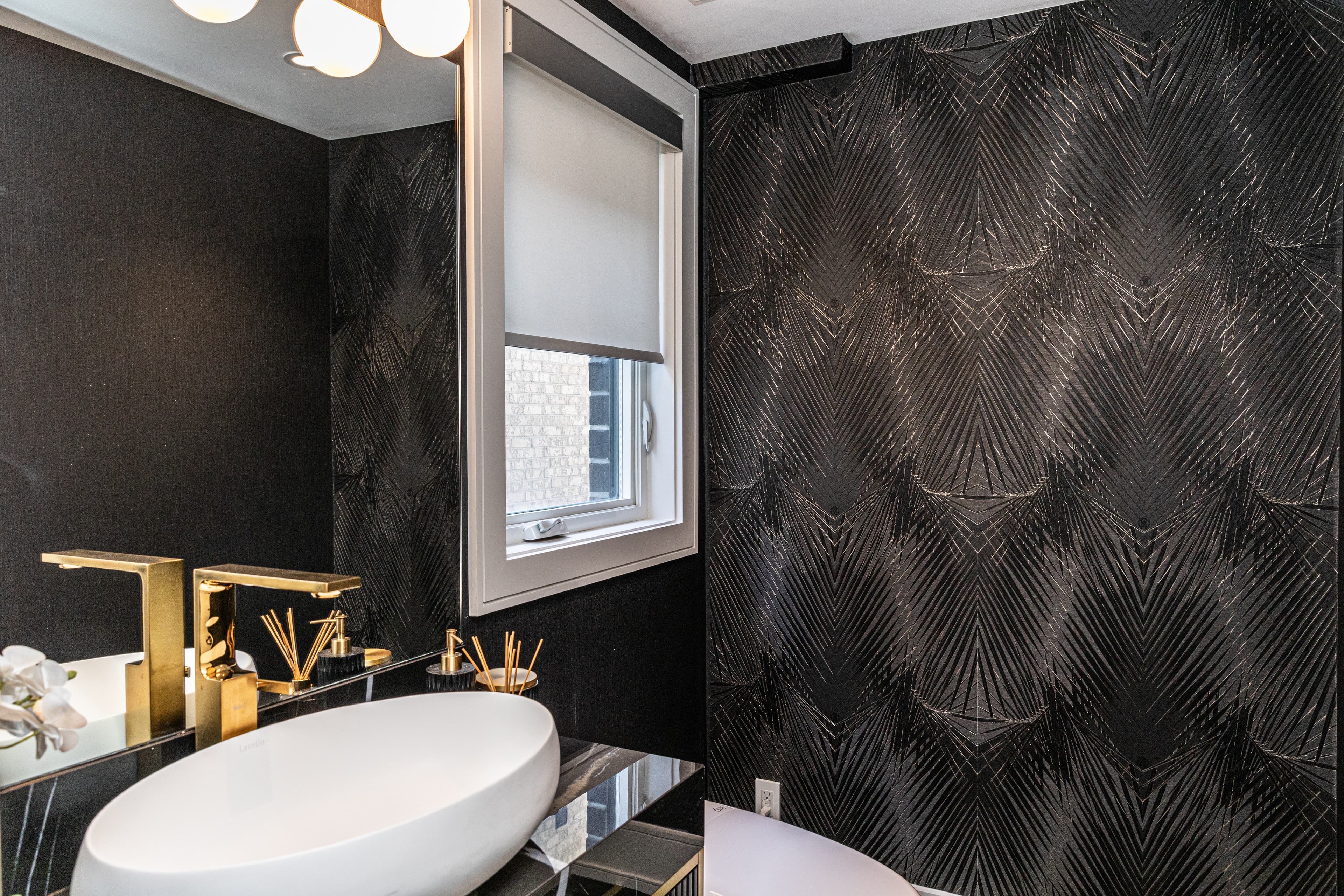 Terrace, powder room with brass fixtures